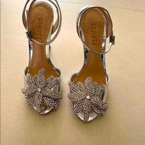 Sandals/heels never been used, beautiful for night events. Silver elegant